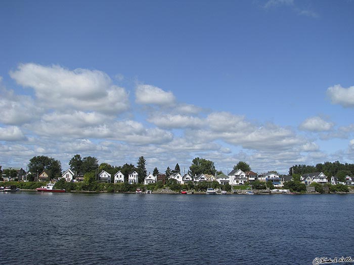 ArcticQ_20080825_143820_496_S.jpg - The scene along the river in Ottawa, Canada shows neat and colorful homes.