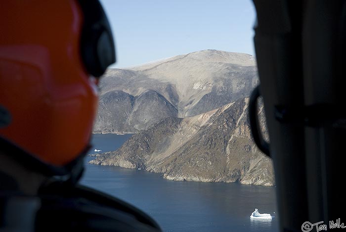 ArcticQ_20080829_143950_802_20.jpg - The pilot guides the 'copter toward a landing site on the mountain on Cape York, Nunavut, Canada.