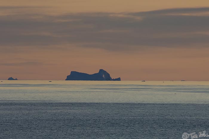 ArcticQ_20080830_212726_079_2X.jpg - A large iceberg is our visual sendoff from the area of Qaanaaq Greenland.