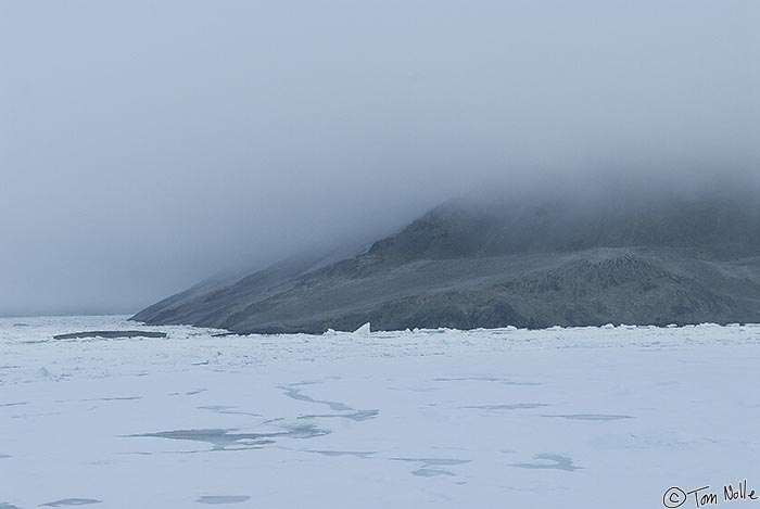 ArcticQ_20080901_094938_287_20.jpg - We approach the coast of the island on our way to the famous fort that was the first International Polar Year station and the site of the Greeley expedition.  Fort Conger, Ellesmere Island, Canada.