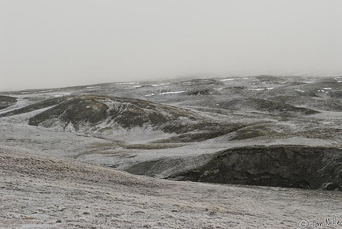 ArcticQ_20080901_101542_348_20.jpg - Tan hills and snow are pretty much what you get at Fort Conger, on the northeast end of Ellesmere Island, Canada.