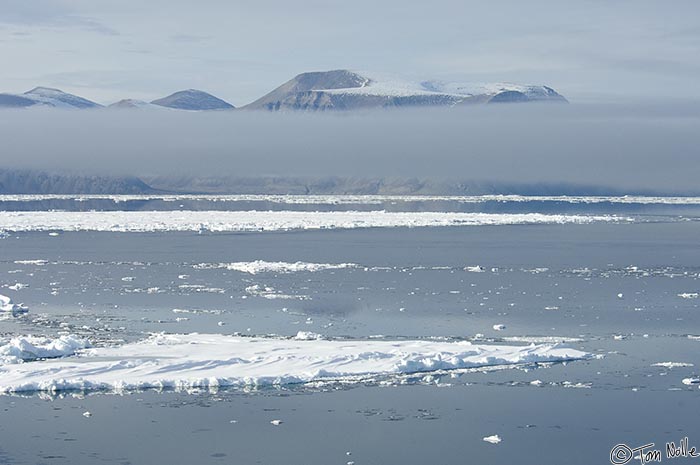 ArcticQ_20080902_132906_734_2X.jpg - Mountains line the shores of the Kennedy Channel between Ellesmere Island and northwest Greenland.  These are on the west coast of Greenland.