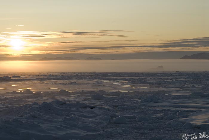 ArcticQ_20080902_203420_927_20.jpg - This is likely the last of the pack ice we'll see, and the combination of ice, fog, and sunset creates an almost surreal landscape.  Baffin Bay between Greenland and Ellesmere Island.