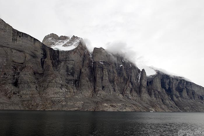 ArcticQ_20080906_143244_587_20.jpg - The steep sides of Sam Ford Fjord seem almost like the walls of a fortress.  Baffin Island, Nunavut, Canada.