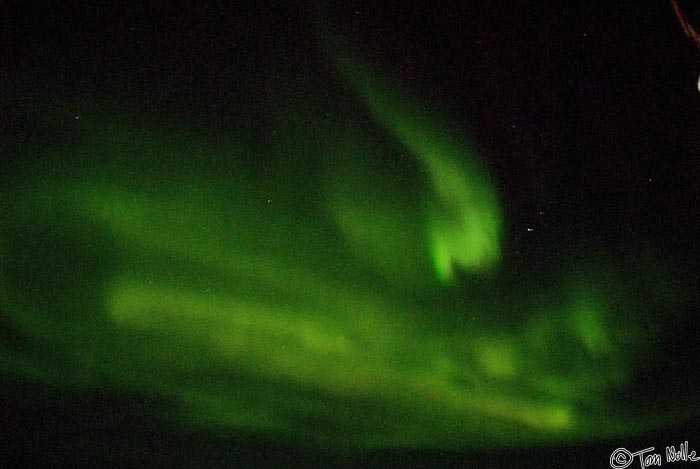 ArcticQ_20080908_224304_939_20.jpg - Sometimes the aurora forms a set of parallel curtains with bright zones.  Baffin Island, Nunavut, Canada.