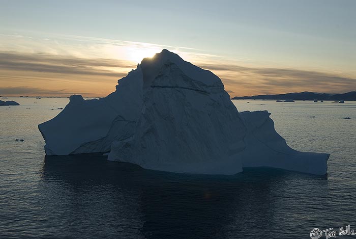 ArcticQ_20080829_193208_958_20.jpg - A large iceberg blocks the sunset off Cape York, Nunavut, Canada.