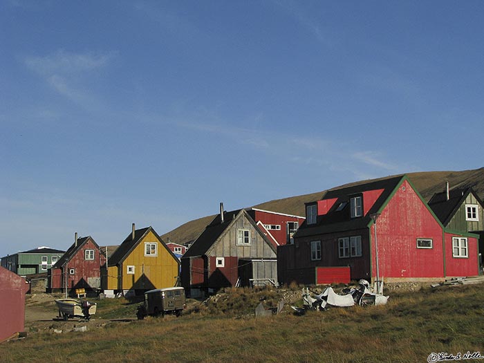 ArcticQ_20080830_084858_532_S.jpg - Many homes in arctic communities are painted bright colors, perhaps to offset drab surroundings.  Qaanaaq,Greenland.