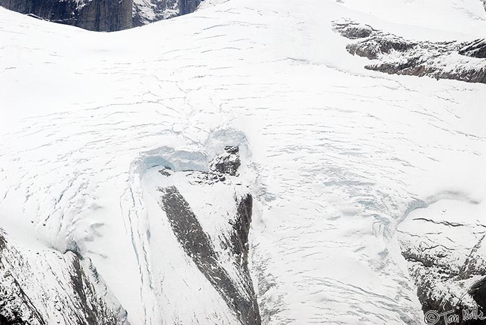 ArcticQ_20080906_112300_393_20.jpg - A hanging glacier has taken on the rough shape of a heart.  Sam Ford Fjord, Baffin Island, Nunavut, Canada.